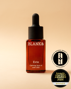 Blank & Evie calming face oil with CBD on a beige background with awards logos.